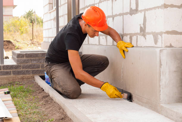 Waterproofing professionals working in Viola, IL